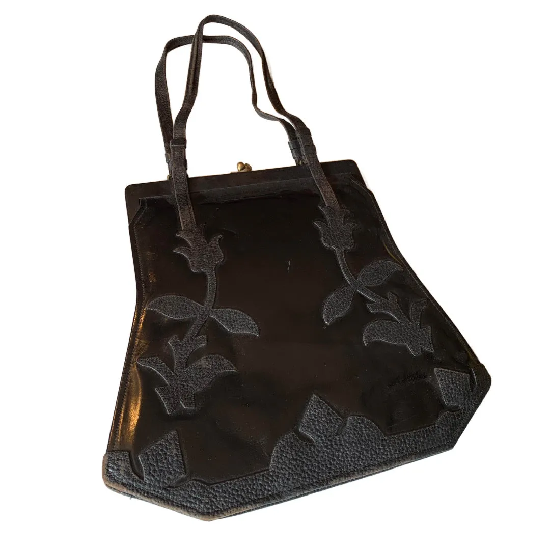 Large Black Patent Leather Handbag with Textured Leather Floral Design circa 1910s